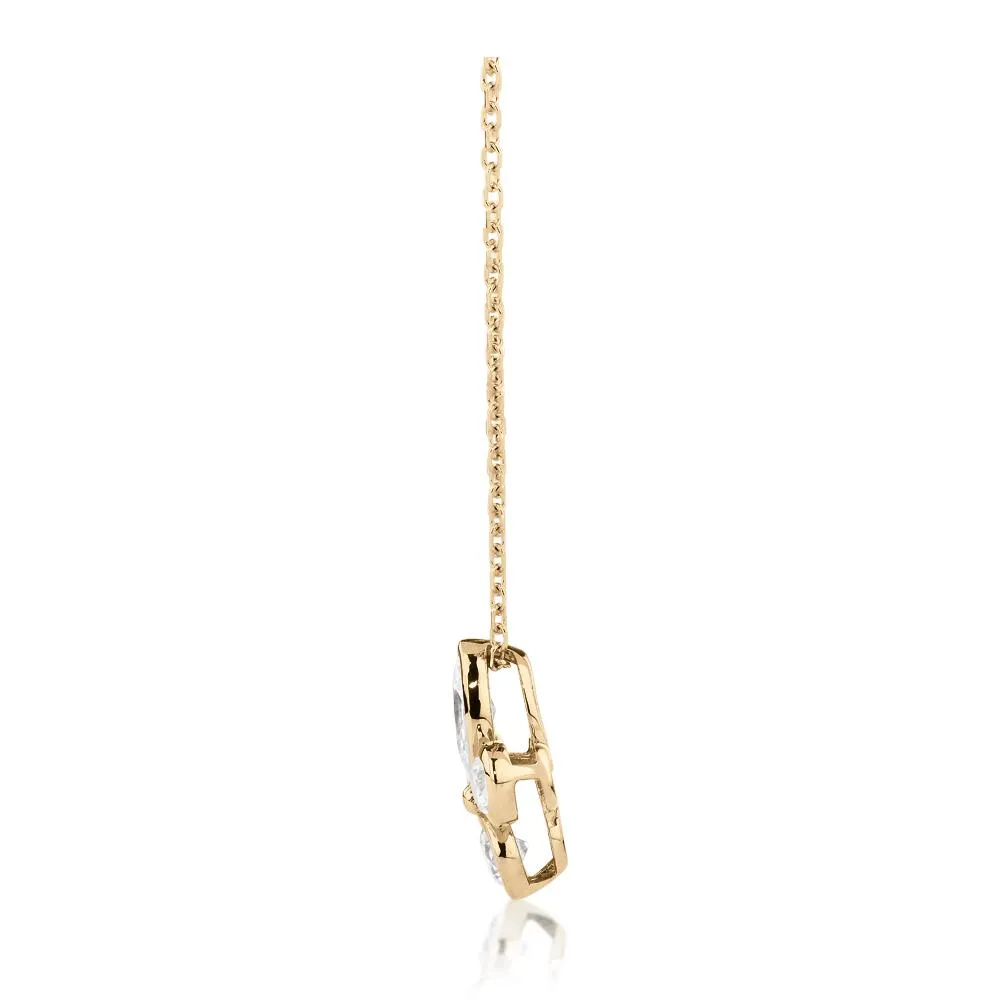 Fancy pendant with 0.58 carats* of diamond simulants in 10 carat yellow gold